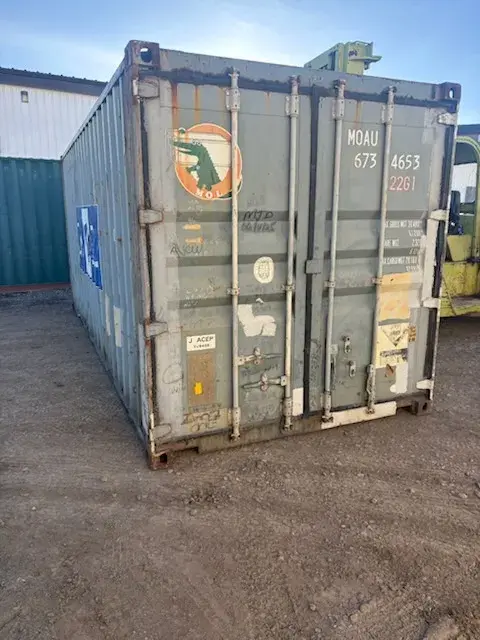 20' Standard Used, container MOAU 673465-3, green, in the Reno yard