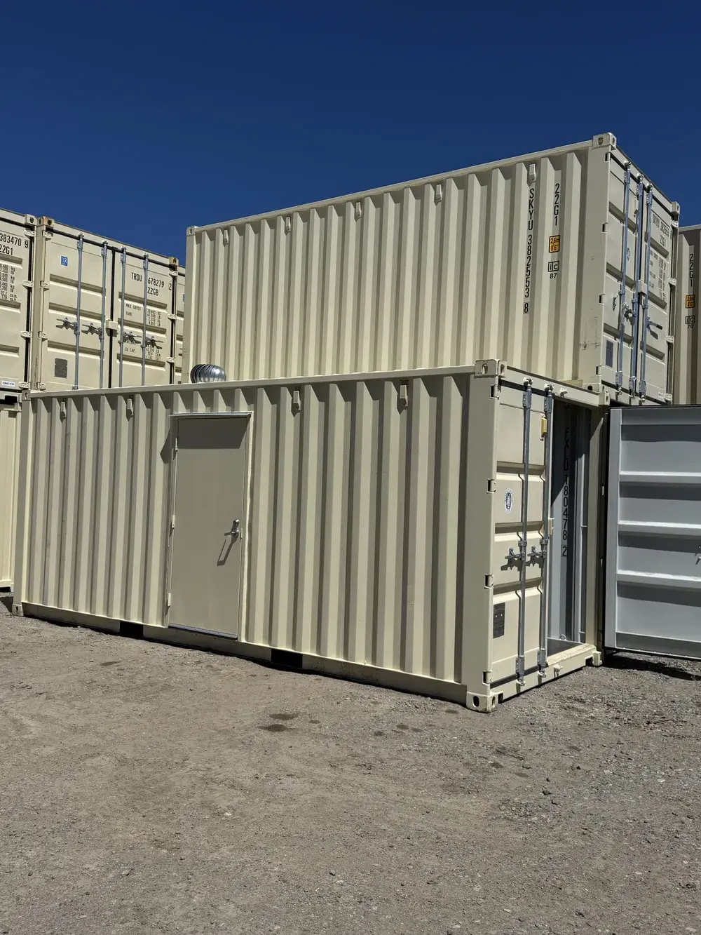 20' Standard One Trip w/man door and rooftop vent, container FXLU 180478-2, tan, in the Reno yard
