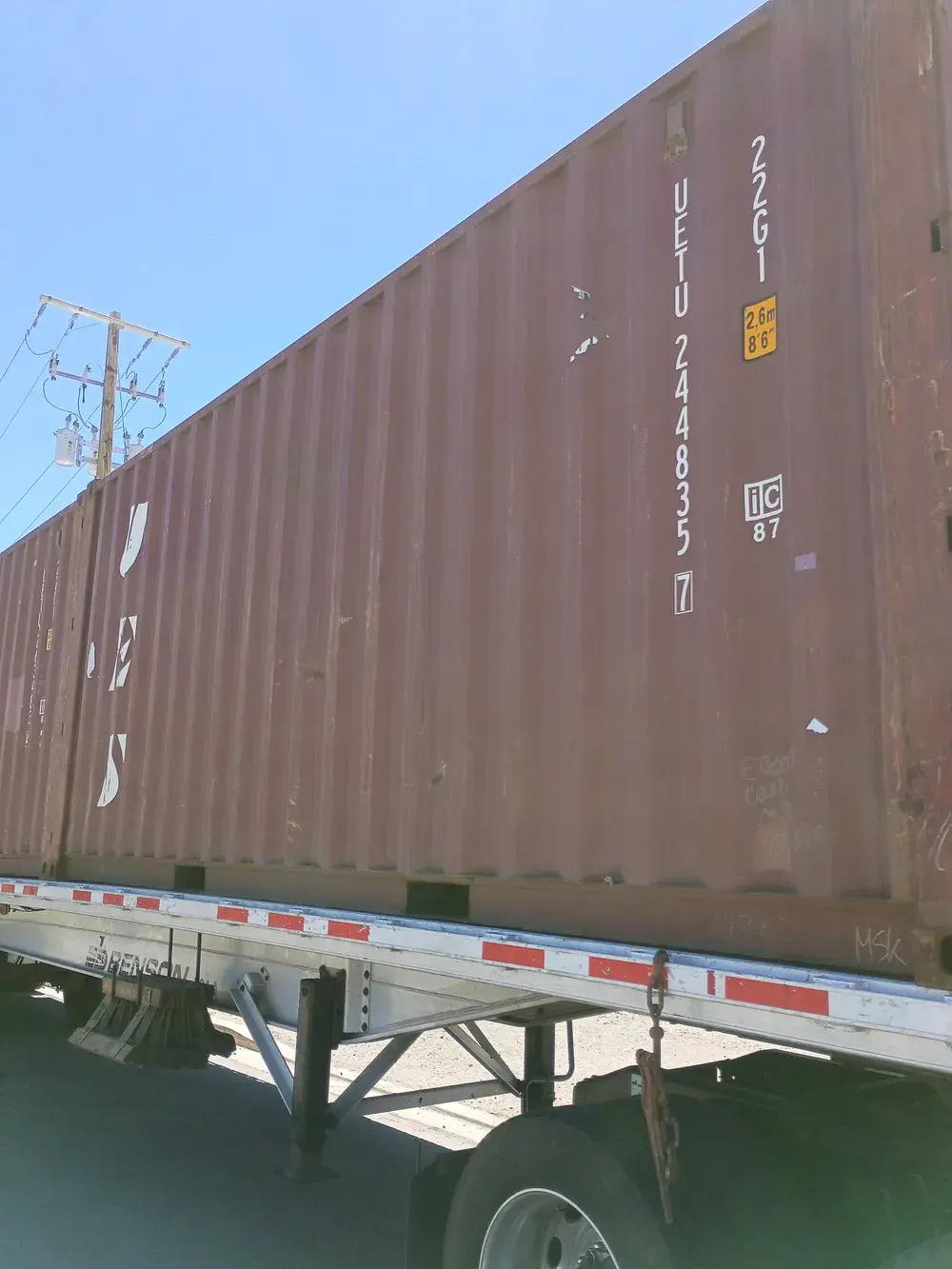 20' Standard Used, container UETU 244835-7, brick, in the Reno yard