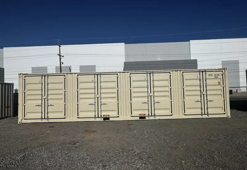 A tan one trip container standing in the Reno yard